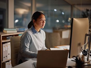 Asian businesswoman, laptop and office at night for working, proj