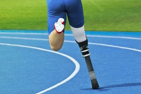 athlete with carbon prosthesis  on race track