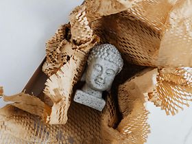buddha kopf verpackt
