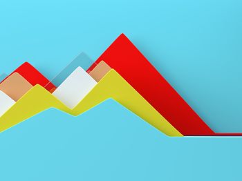 buntes flaechendiagramm mit pastellfarben auf blau