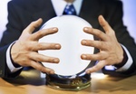 Close-up mid section of man touching crystal ball
