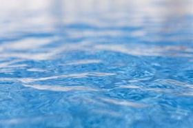 Close up of shimmering water in swimming pool