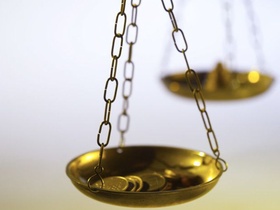 Close-up of the scales of justice