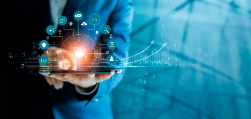 Businessman using tablet analyzing sales data and economic growth graph chart, Technology and icon c