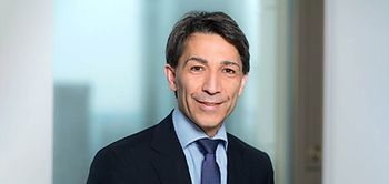 Dr. Thomas Tomkos, Russell Reynolds Associates