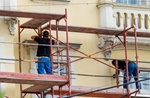 Fassadenarbeiten auf Gerüst
