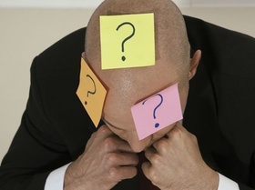 Fragezeichen auf Kopf