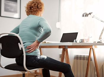 Frau Rückenschmerzen