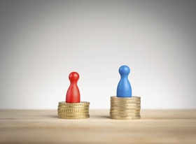 Wage gap concept with blue figure symbolizing men and red pawn women