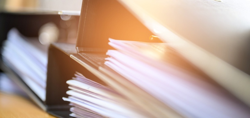 Black document file on the office desk