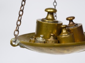 Copper weights on scale