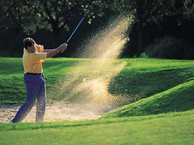 Golf und Sand