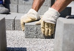 Hände Bauarbeiter Bauhandschuh Steine