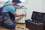 central heating mechanic handyman fixing radiator seasonal issue
