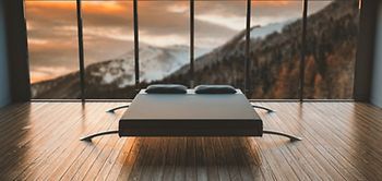 Hotel Hotelzimmer modern Panoramafenster Berge Bett