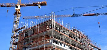 Hausbau Mehrfamilienhaus Kräne Kran Rohbau Wohnungen