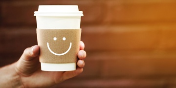 Kaffeetasse mit lachenden Gesicht Smiley