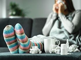 Krank auf dem Sofa