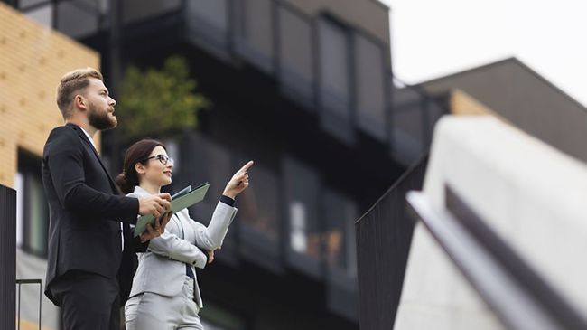 young businesswoman on a meeting with a real estate agent