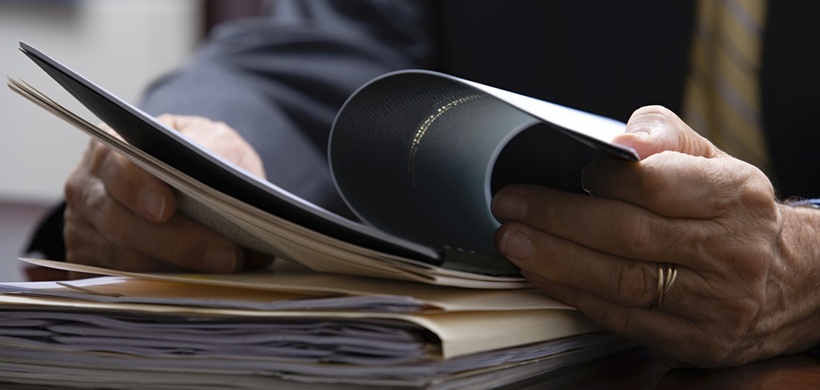 Businessman looking at paperwork