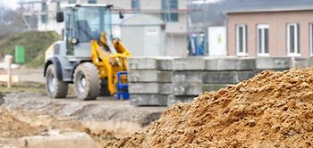 Bagger Grundstück Wohnungsbau