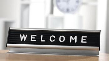 Schild Welcome in Buero