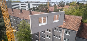 Serielle Sanierung trifft Aufstockung