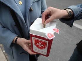 Volunteer collecting money for charity