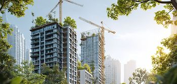 Stadt Hochhäuser Gebäude Kran Kräne Bäume grün