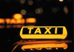 Taxi-Zeichen, beleuchtet, nachts