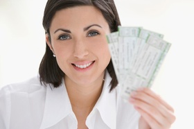 Woman holding tickets