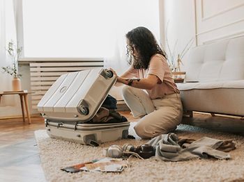Urlaub Reise Koffer packen