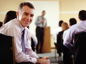 Weiterbildung Seminar lachender Mann