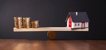 Wippe Geld Haus Immobilienkauf