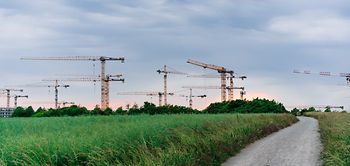wohnquartier_baustelle_kranlandschaft