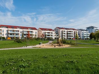 wohnumfeld_Neubau_Quartier_Spielplatz