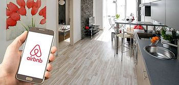 Wohnung Hand Smartphone Airbnb