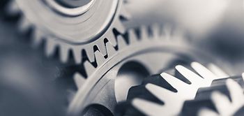 Zahnräder Zahnrad Großaufnahme silbern Stahl