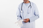 Arzt mit Handschuhen  Arzt mit Handschuhen